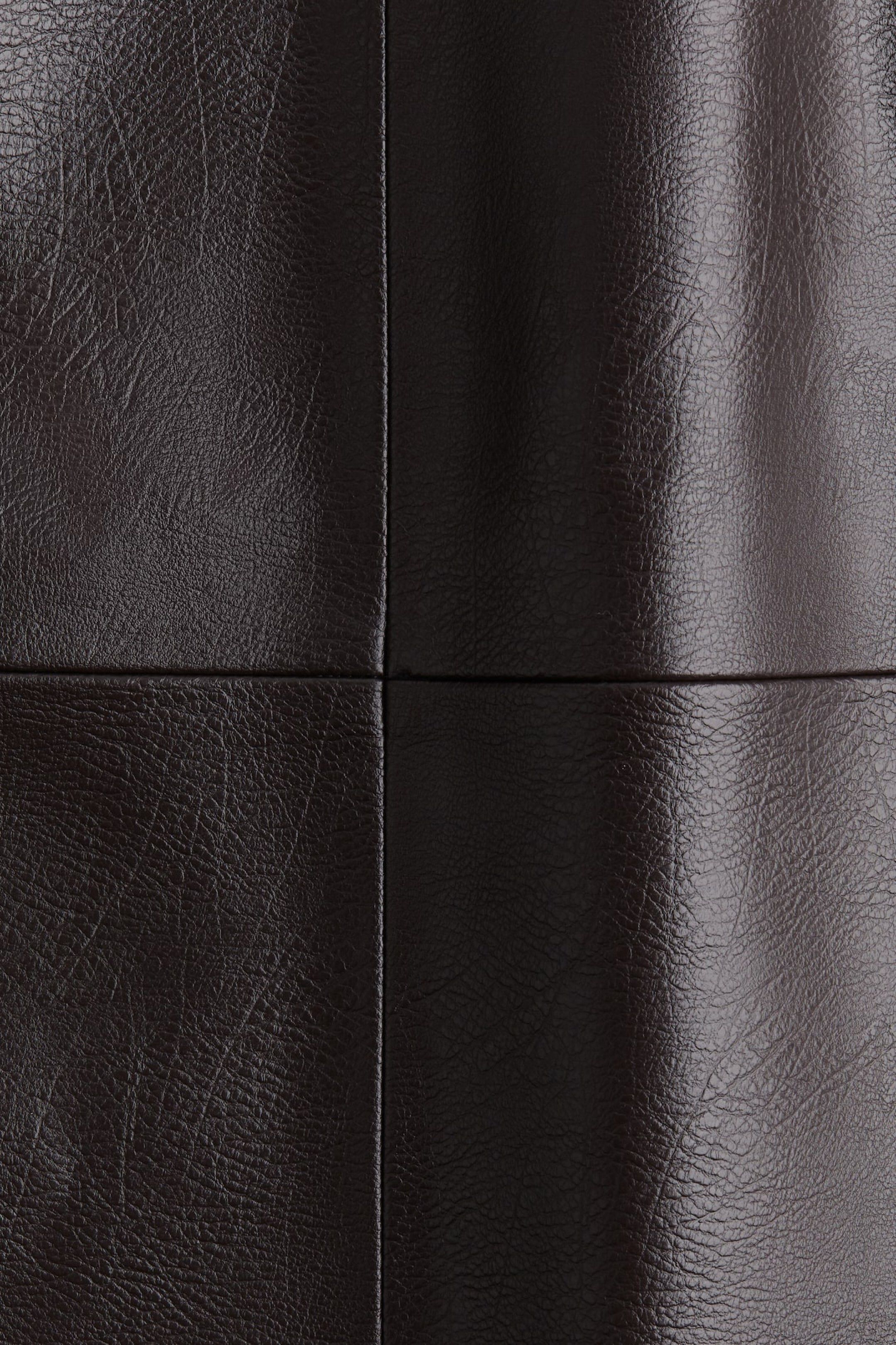 H&M Edition Leather Skirt (Category: Skirts) located in Pasig City. Submitted by NCloset (Listing ID 1418533832, Image 2). Description: NEVER WORN H&M Edition Brown Leather Skirt - Color: Dark Brown - Style: Midi skirt with panelled design - Size: EUR 34/ US 2 - Closure: Zipper and button - Material: Leather - Perfect for Travel OOTDs and Office Outfits - RFS: Sitting in my closet and never used 🥹 - Bought this in its regular price but now it’s 