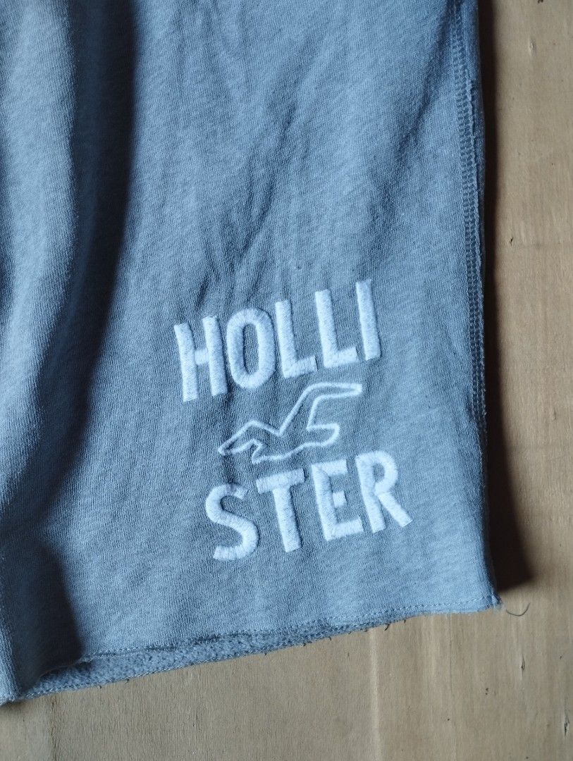 Hollister Gray Shorts - Size M (Category: Shorts) located in Orion. Submitted by thrift___drip (Listing ID 1418467232, Image 2). Description: Hollister gray shorts M on tag Dimes: Waist: 32" Length: 20" Hem: 11" - Drawstring waist - Hollister logo on front - Two side pockets - Soft, comfortable material - Perfect for casual wear.