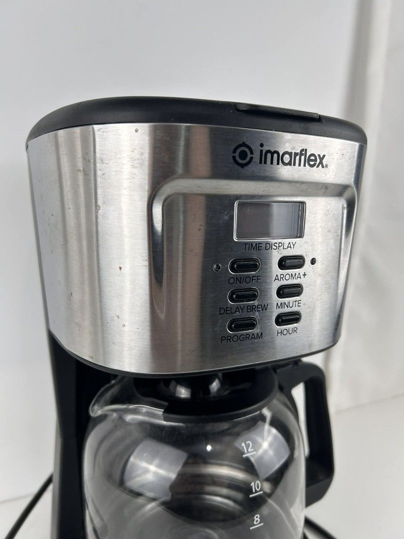 Imarflex Aroma-Tech Coffee Maker (Category: Coffee Machines & Makers) located in Quezon City. Submitted by clmcr (Listing ID 1418446891, Image 3). Description: PLEASE READ DESCRIPTION CAREFULLY BEFORE BUYING. THANK YOU. - Well used but still in good condition with few stains. (shown in photos) - Will need thorough cleaning, as it was kept in the box without cleaning due to limited time. - Comes complete with its original box. - 900 watts, automat