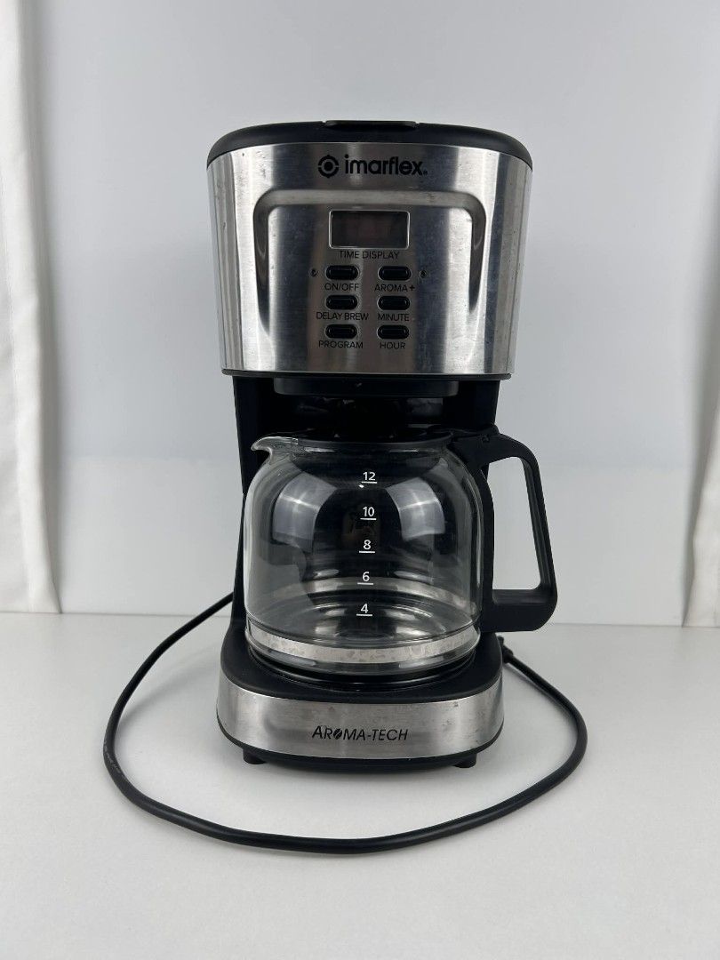 Imarflex Aroma-Tech Coffee Maker (Category: Coffee Machines & Makers) located in Quezon City. Submitted by clmcr (Listing ID 1418446891, Image 1). Description: PLEASE READ DESCRIPTION CAREFULLY BEFORE BUYING. THANK YOU. - Well used but still in good condition with few stains. (shown in photos) - Will need thorough cleaning, as it was kept in the box without cleaning due to limited time. - Comes complete with its original box. - 900 watts, automat