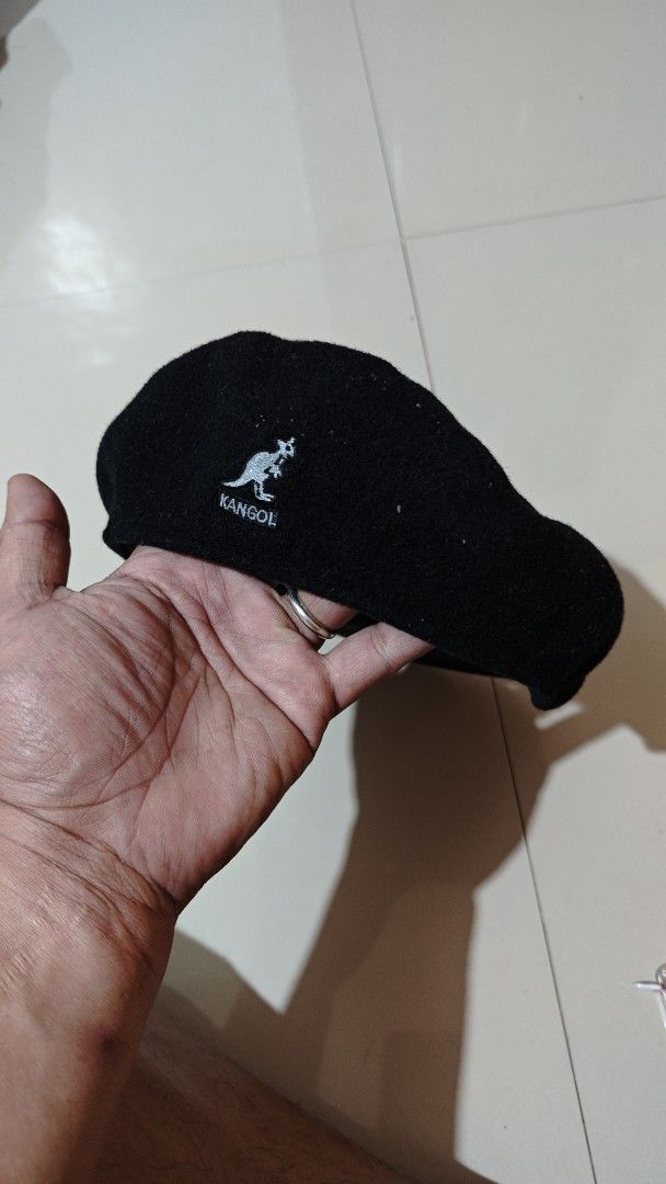 Kangol Wool Beret - Black (Category: Caps & Hats) located in Davao. Submitted by jhinkertzp55934 (Listing ID 1418405130, Image 1). Description: - Authentic Kangol beret - Color: Black - Size: XLARGE - Material: Wool - Features Kangol logo - Designed in Belgium - Classic and stylish accessory.