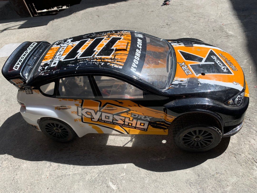 Kyosho DRX Subaru RC Car (Category: Remote Control Toys) located in Manila. Submitted by miah_collectiblesurplus (Listing ID 1418534990, Image 1). Description: 15,000 pesos Location: Valenzuela Kyosho DRX 1/9 Scale Subaru Impreza radio-controlled rally car Untested wala remote Pero working motor From Japan item as is.