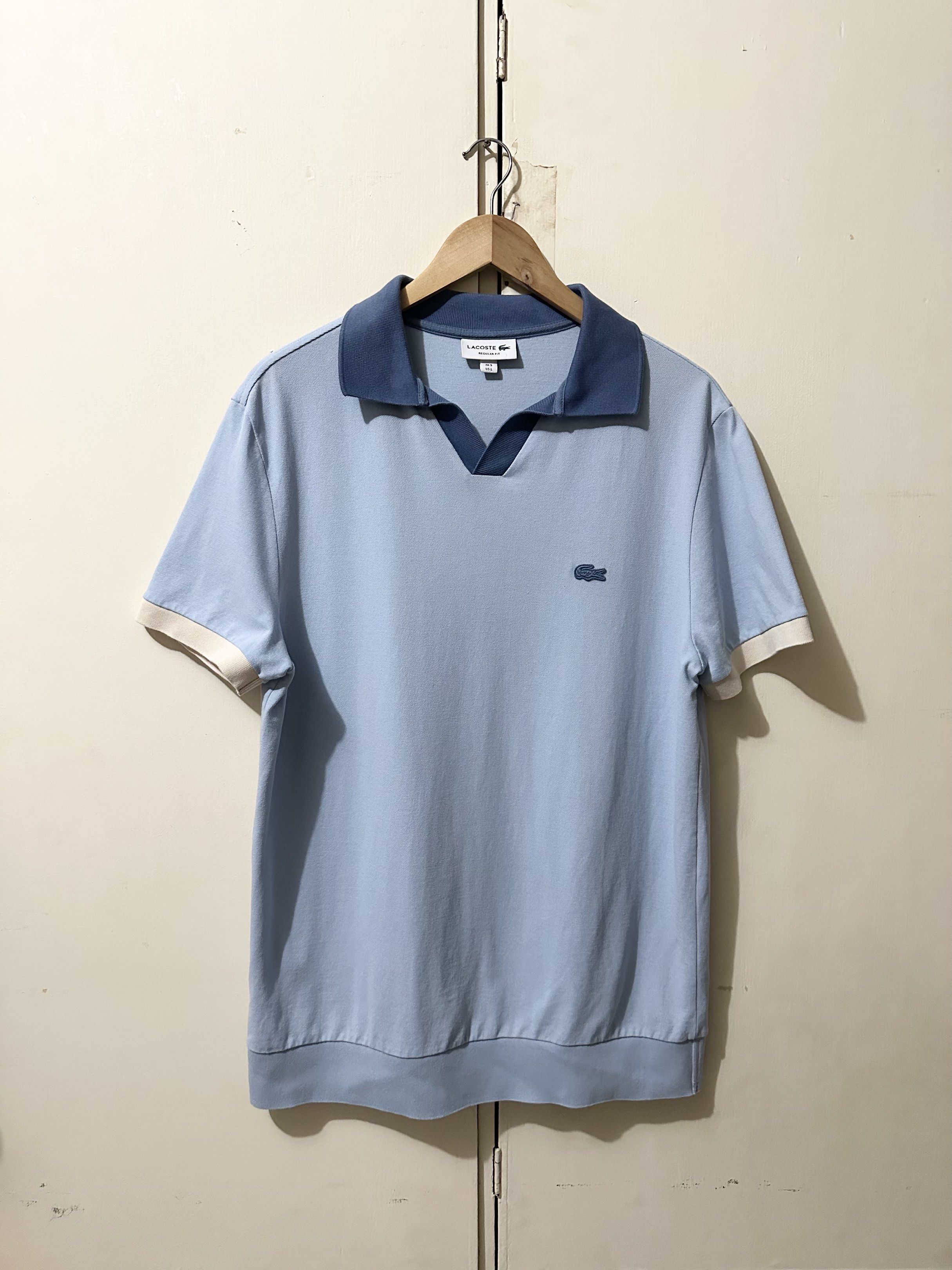 Lacoste Regular Fit Polo Shirt (Category: Tshirts & Polo Shirts ) located in Manila. Submitted by 4buying (Listing ID 1418416523, Image 1). Description: - Lacoste polo shirt - Light blue color - Size: L - Unique collar design - Iconic crocodile logo - Regular fit - 100% cotton - Darker blue collar and cuffs 27 x 22.