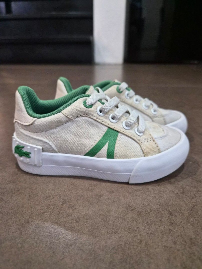 Lacoste sneakers for baby (Category: Babies & Kids Fashion) located in Quezon City. Submitted by tiny_abee (Listing ID 1418431755, Image 2). Description: size: US7 bought brand new sa rustans has yellow stains.