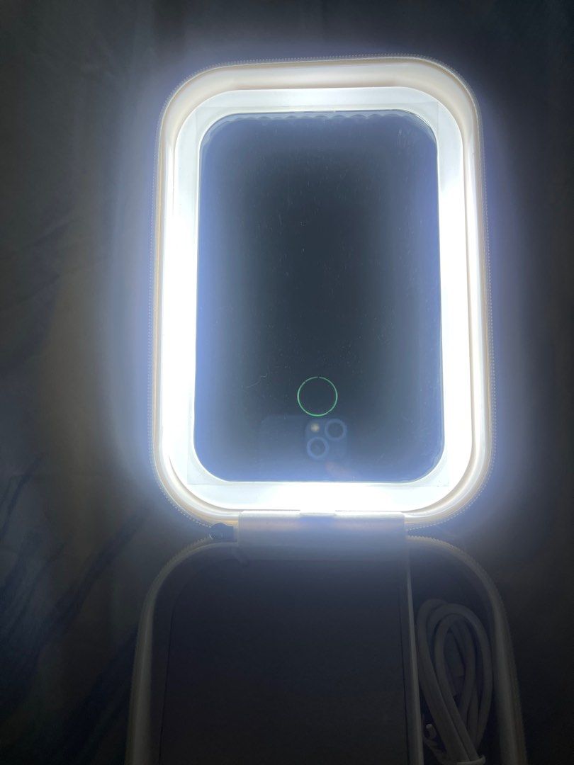 LED Lighted Makeup Storage with mirror (Category: Makeup) located in Quezon. Submitted by lainesells.08 (Listing ID 1418509221, Image 3). Description: - LED-lit makeup mirror for perfect lighting - Adjustable brightness settings - Built-in storage compartment with dividers - Includes charging cable - Sleek, modern rectangular design - Ideal for makeup and skincare.