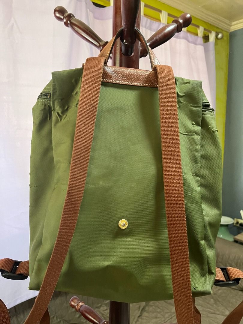 Longchamp Le Pliage Backpack Original - Green (Category: Luxury Bags & Wallets) located in Binan City. Submitted by geepch (Listing ID 1418481021, Image 2). Description: Longchamp Le Pliage Backpack Original Original price: Php 5,500 Selling price: Php 2,500 Bought: 2017 This is a preloved item, please set your expectation, item shows normal wear and tear through constant use..