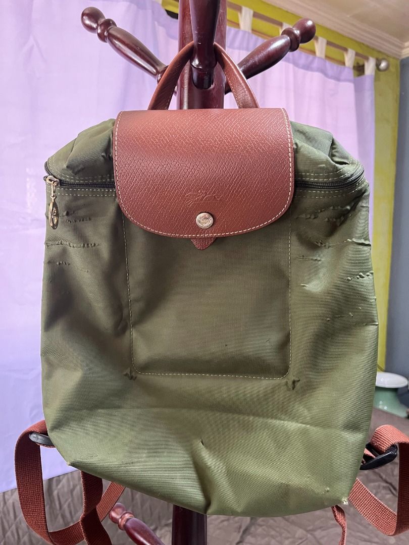 Longchamp Le Pliage Backpack Original - Green (Category: Luxury Bags & Wallets) located in Binan City. Submitted by geepch (Listing ID 1418481021, Image 1). Description: Longchamp Le Pliage Backpack Original Original price: Php 5,500 Selling price: Php 2,500 Bought: 2017 This is a preloved item, please set your expectation, item shows normal wear and tear through constant use..