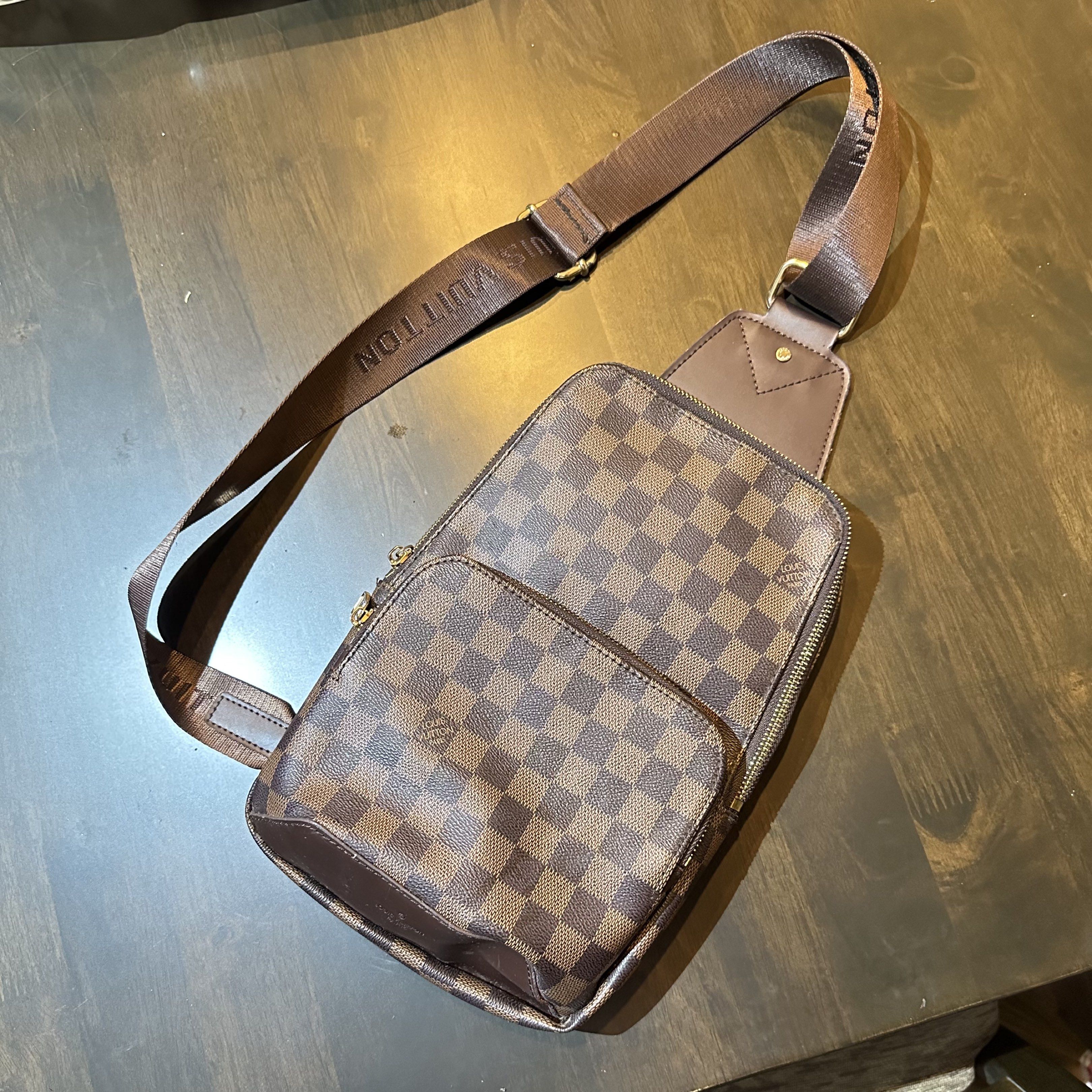 Louis Vuitton Damier Ebene Body Bag (Category: Luxury Bags & Wallets) located in Caloocan City. Submitted by plukjohnmi28375 (Listing ID 1418529012, Image 1). Description: Just need a bit of cleaning, but overall, in good condition. RFS: Not my type and nakatambak lang, padala from Australia. Inclusions: Bag and Dust bag only Asking Price: P19500 Meet up: Alabang Muntinlupa .