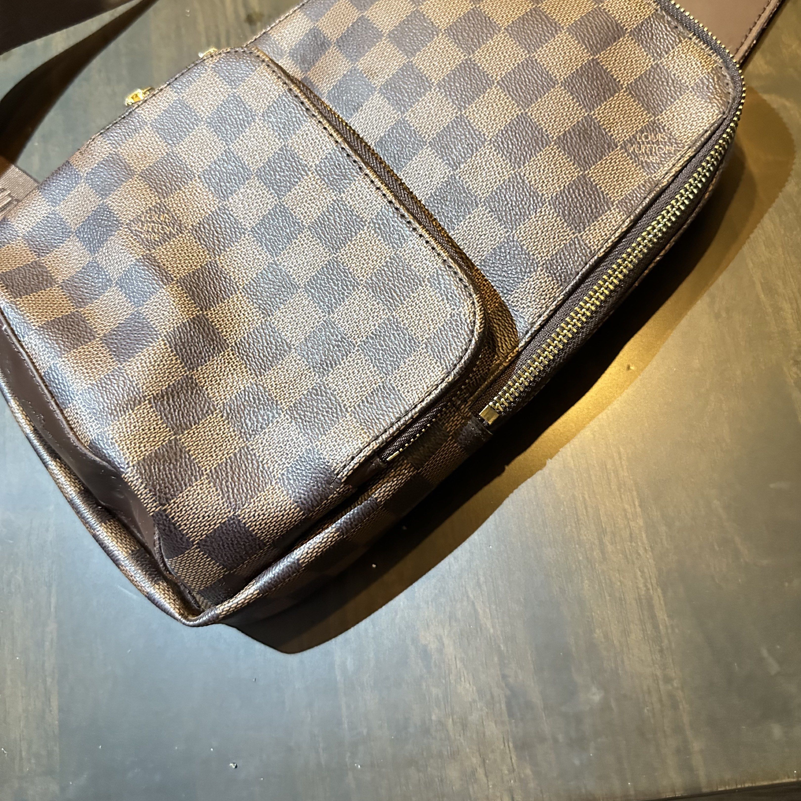 Louis Vuitton Damier Ebene Body Bag (Category: Luxury Bags & Wallets) located in Caloocan City. Submitted by plukjohnmi28375 (Listing ID 1418529012, Image 3). Description: Just need a bit of cleaning, but overall, in good condition. RFS: Not my type and nakatambak lang, padala from Australia. Inclusions: Bag and Dust bag only Asking Price: P19500 Meet up: Alabang Muntinlupa .