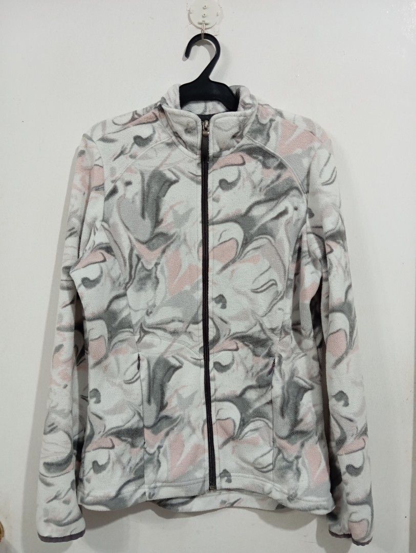 Marks & Spencer Collection Fleece Jacket M&S (Category: Coats, Jackets and Outerwear) located in Muntinlupa City. Submitted by challasy (Listing ID 1418573513, Image 1). Description: M&S Collection fleece jacket features a unique pattern in shades of gray, pink, and white. It has a full zip closure, two front pockets, and a high collar. The jacket is a UK size 8 and EUR size 36. It is made of a soft fleece material, perfect for cooler weather..