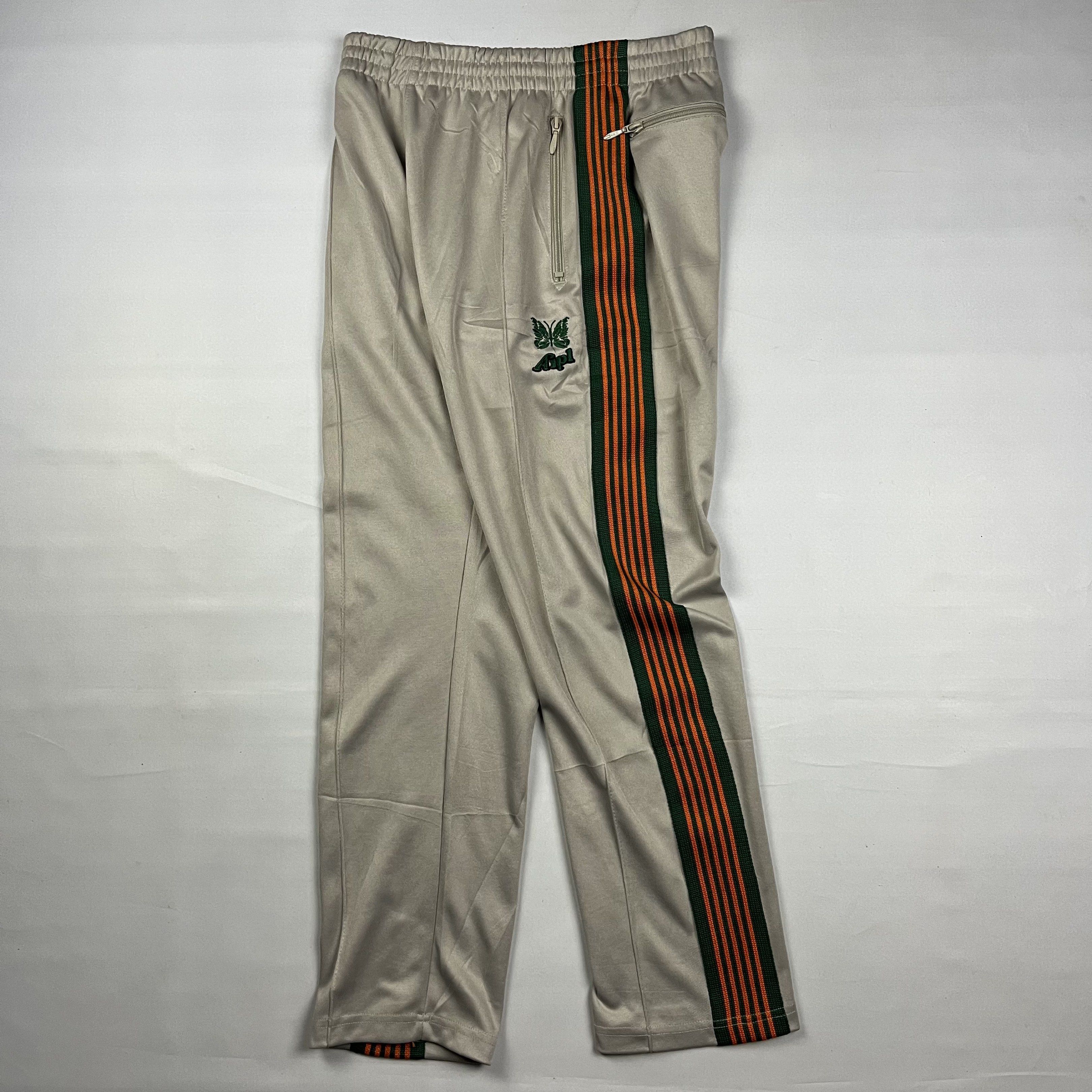 Needles x AIPL Track Pants (Category: Jeans) located in Puerto Princesa. Submitted by paradise5300 (Listing ID 1418574052, Image 2). Description: Needles x AIPL Track Pants Tagged Size: Small Dimensions inches length: 37.5 inches width (waist): 14 inseam: 13.5 leg opening: 7.3 Condition: Excellent Color rate: 10 Flaws: None 3,500 shipping fee is not yet included. .