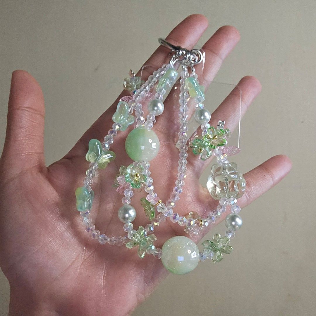 Nine-tailed Fox with UV activated Phone charm (Category: Charms) located in Las Pinas. Submitted by klya00 (Listing ID 1418451953, Image 1). Description: - Eye-catching beaded phone charm - Features clear, iridescent, and green beads. Sparkly in real-life - Includes pearl and flower-shaped accents - Fun uv activated beads that glows - Silver-colored clasp for easy attachment.