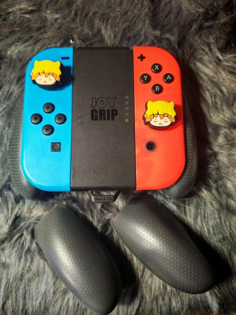 Nintendo Switch Original Joycons W/ JoyGrip Charger (Category: Nintendo) located in Taytay. Submitted by nider_dc (Listing ID 1418534142, Image 1). Description: Working no issue, 2.2k only!! May kasama ng Joygrip worth 800pesos No ISSUE!! Plug and Play!! No ISSUE!! Plug and Play!! No ISSUE!! Plug and Play!! Can works on all version of nintendo switch units 📍 Taytay Rizal .