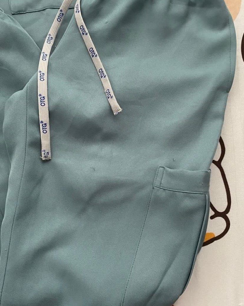 OTG Scrubs Set (Category: Sets or Coordinates) located in Quezon City. Submitted by dan.bam (Listing ID 1418461743, Image 3). Description: OTG SCRUBS - twill fabric used & has my name embroidered - see 3rd pic for minimal flaw (may tastas sa pants) Bought this for 1.6k Rfs:I have too many scrubs already Has embroidery! Otg staff said they remove embroidery names for only 100 php LOCATION: QC can do same day delivery via lalamove & regular shippin