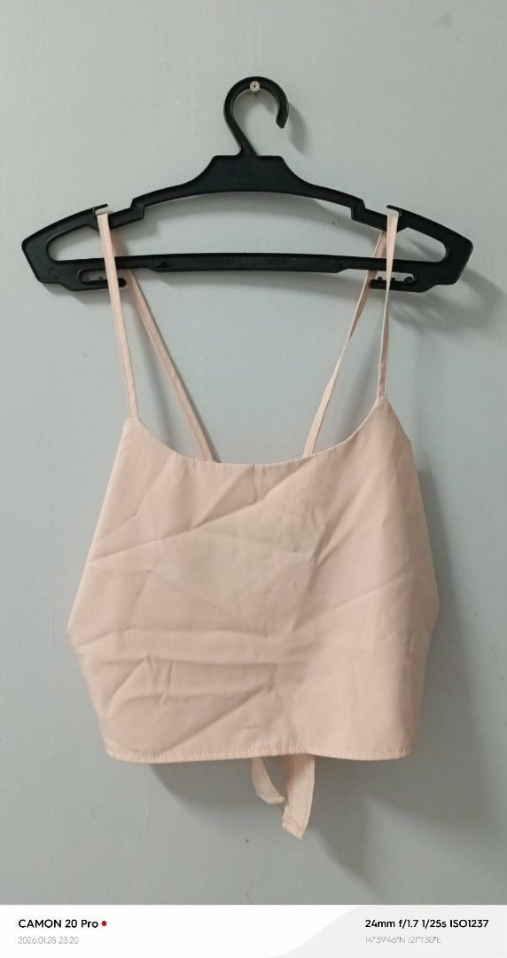 Peach Tie-Back Crop Top (Category: Sleeveless) located in Quezon City. Submitted by sheila0721 (Listing ID 1418465502, Image 2). Description: - Peach crop top - Tie-back design - Thin straps - Gathered front detail - Crop top style - Casual and chic.