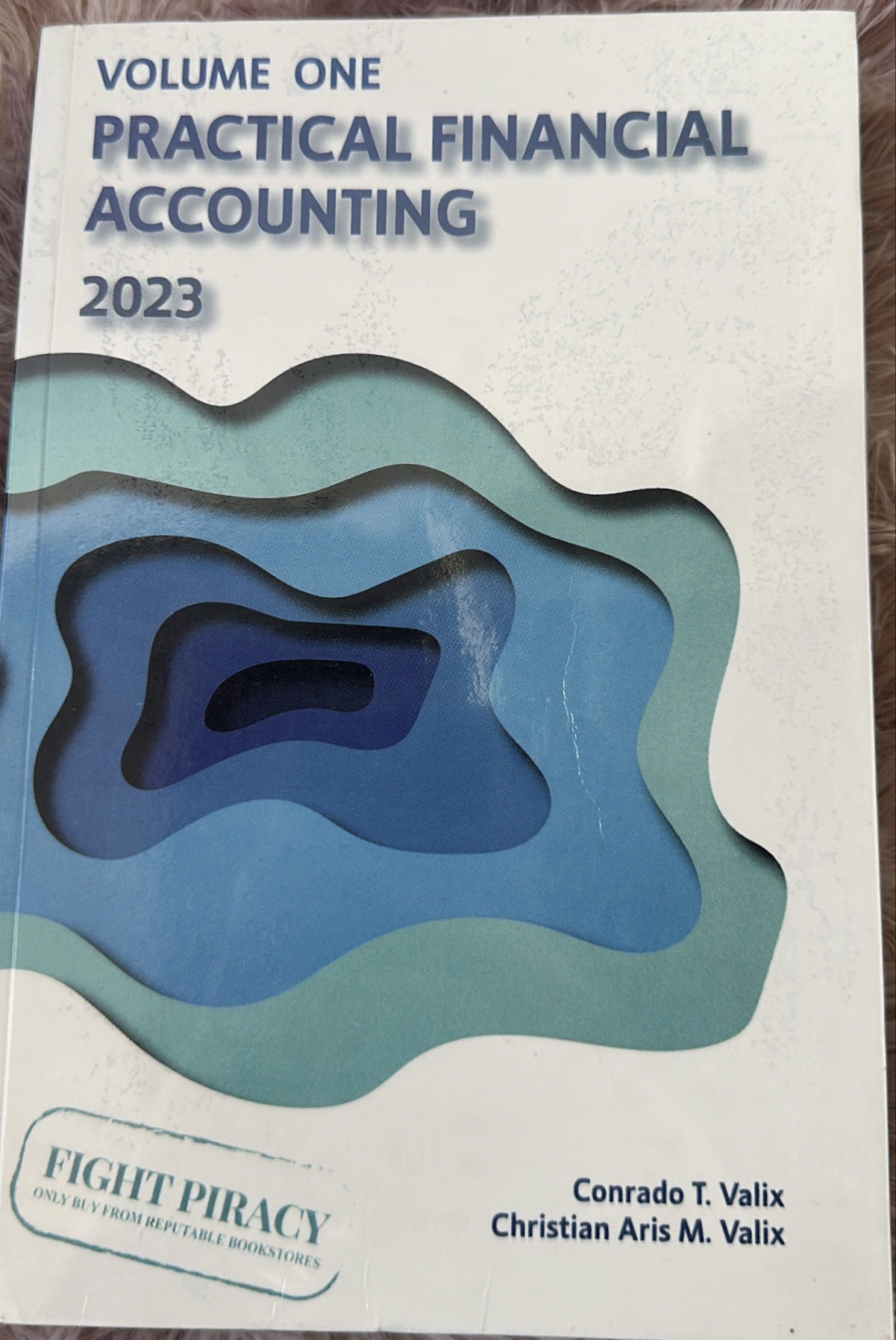 Practical Financial Accounting 2023 (Volume 1) - Valix (Category: Textbooks) located in San Jose del Monte. Submitted by hbess (Listing ID 1418474404, Image 1). Description: • Slightly used • with plastic cover • few pencil writings Lady-owned: maingat po ako sa book, lahat naka-plastic cover. Walang lukot. Dm/pm for more pictures/videos of the book Meet-up: Taft (Vito Cruz station) or DLSU .