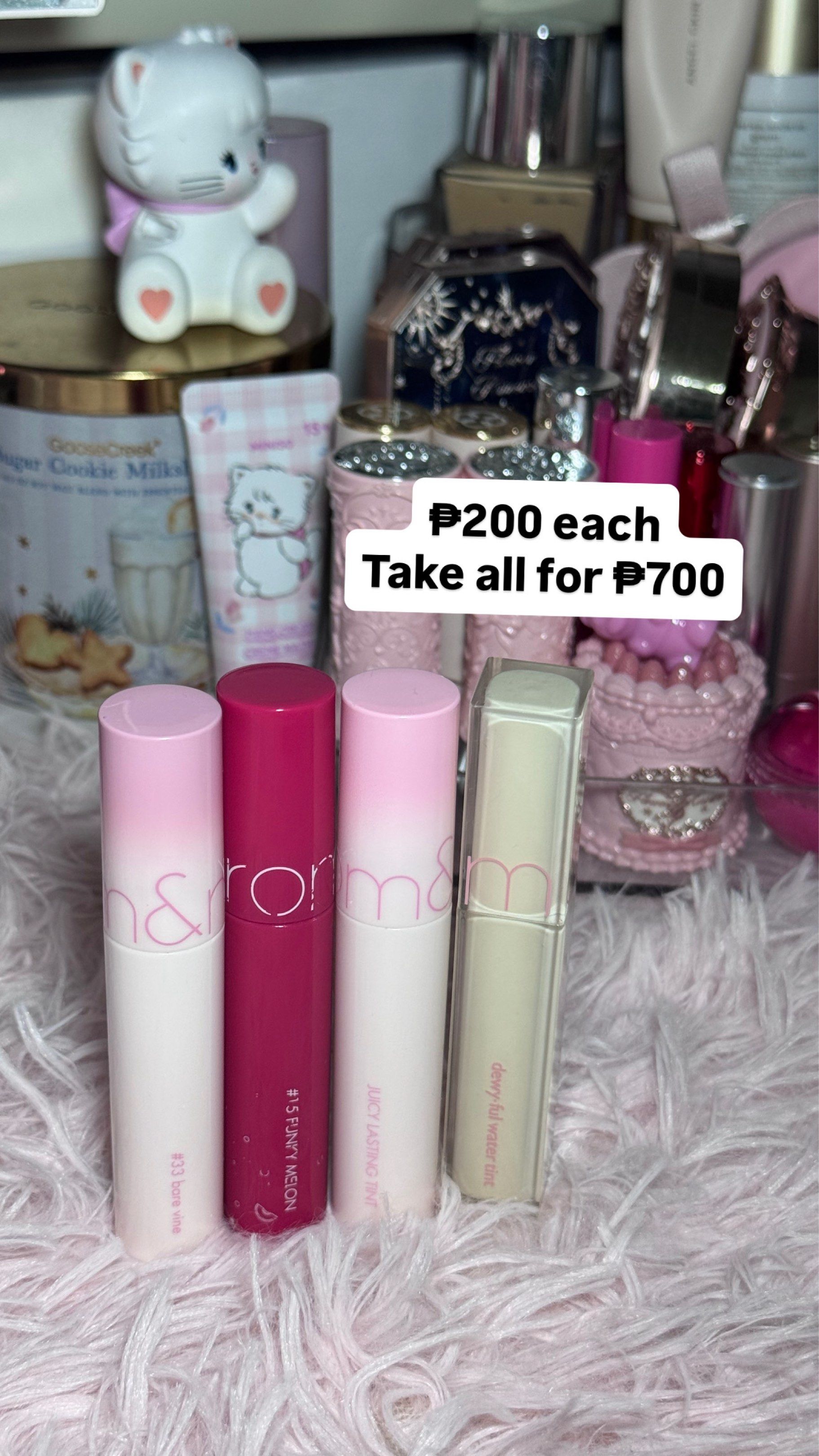 ROMAND Juicy Lasting tint (Category: Makeup) located in Cavite. Submitted by kaokao_declutter (Listing ID 1418572032, Image 1). Description: #33 bare vine #32 bare berry smoothie #10 murmur pink #15 funky melon All 85% left, ₱180 each but if get all ₱700 only.
