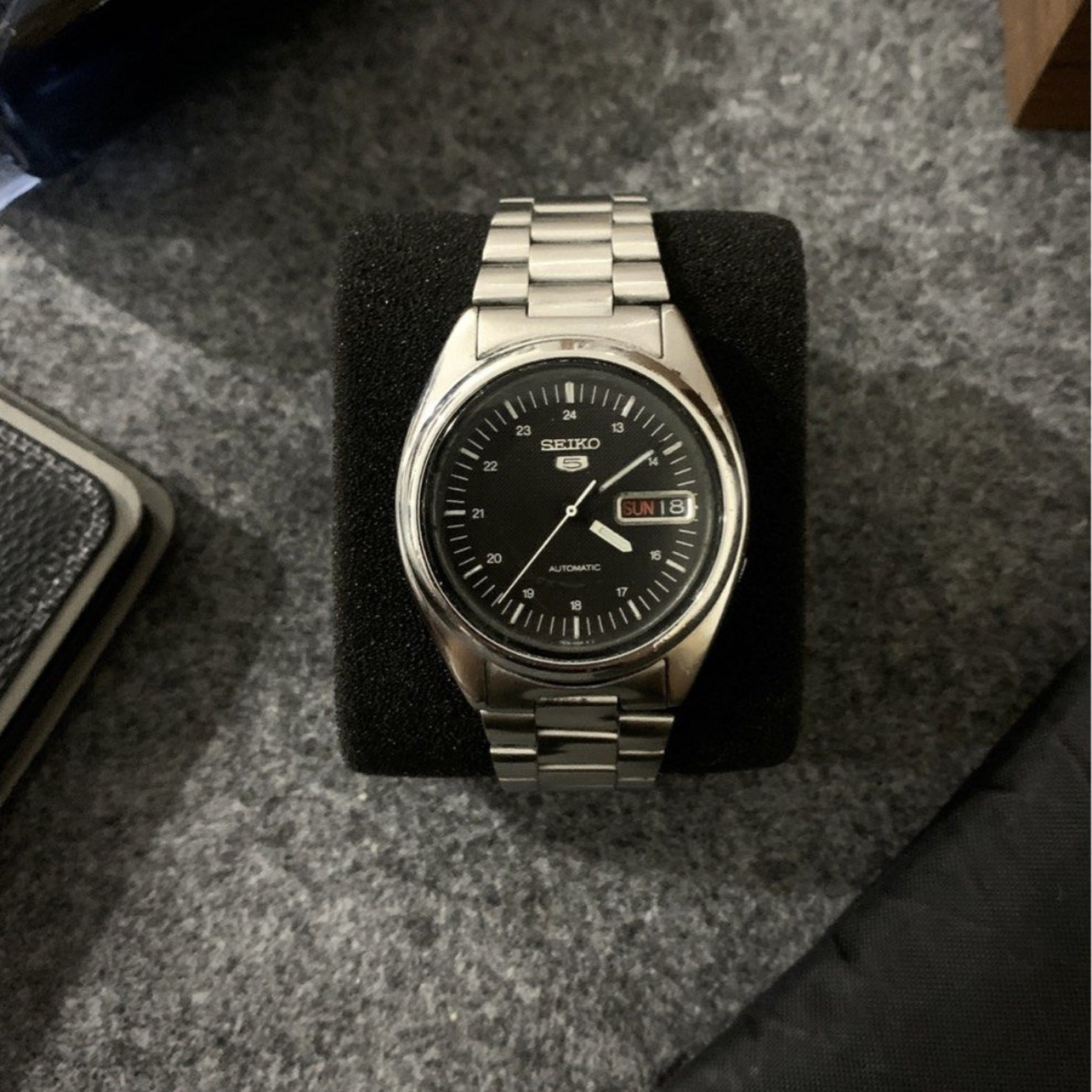 Seiko 5 Automatic Watch (Category: Men's Watches) located in Manila. Submitted by 99rocket (Listing ID 1418496998, Image 1). Description: Seiko 5 Black Modern Military Waffle Dial Caliber 6309 Ref # 7009-876A Automatic Movement Bracelet fits up to 6.5 inches on wrist BMBY 1988 38mm Luminous Hands Automatic Movement All Original Parts Excellent Running Condition Newly Serviced Newly Buffed / Polished Ready to Wear, Nothing to Fix Issue: not workin