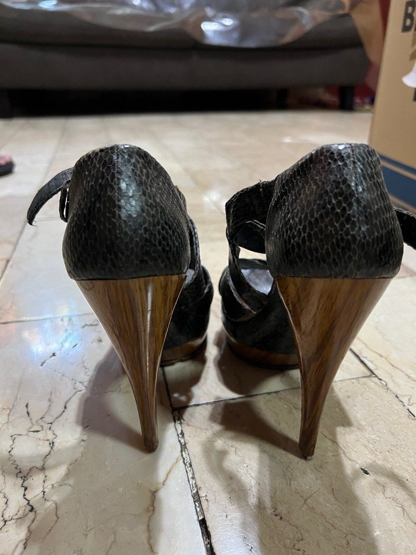 Snake Skin Heels (Category: Heels) located in Quezon City. Submitted by bri_ds (Listing ID 1418487824, Image 3). Description: - Snake skin pattern heels - Ankle strap - Wooden heel - Platform sole - Perfect for elegant outfits.