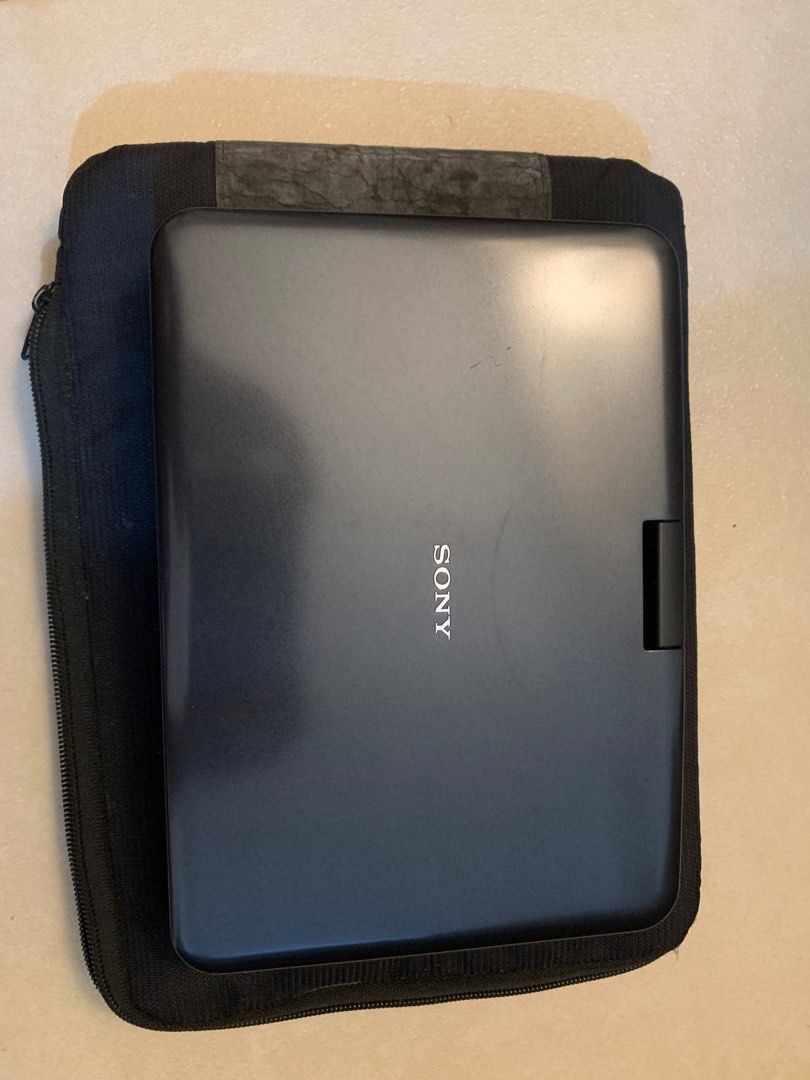 Sony Portable DVD Player (with Carry Case & Extra Battery) (Category: Printers, Scanners & Copiers) located in Taguig. Submitted by igeovaaan (Listing ID 1418512571, Image 2). Description: Sony Portable DVD Player (with Carry Case & Extra Battery) Selling an original Sony Portable DVD Player Working condition: Unsure since I have never tested it What’s included (as shown in photos): • Sony Portable DVD Player • Extra detachable battery • Sony car