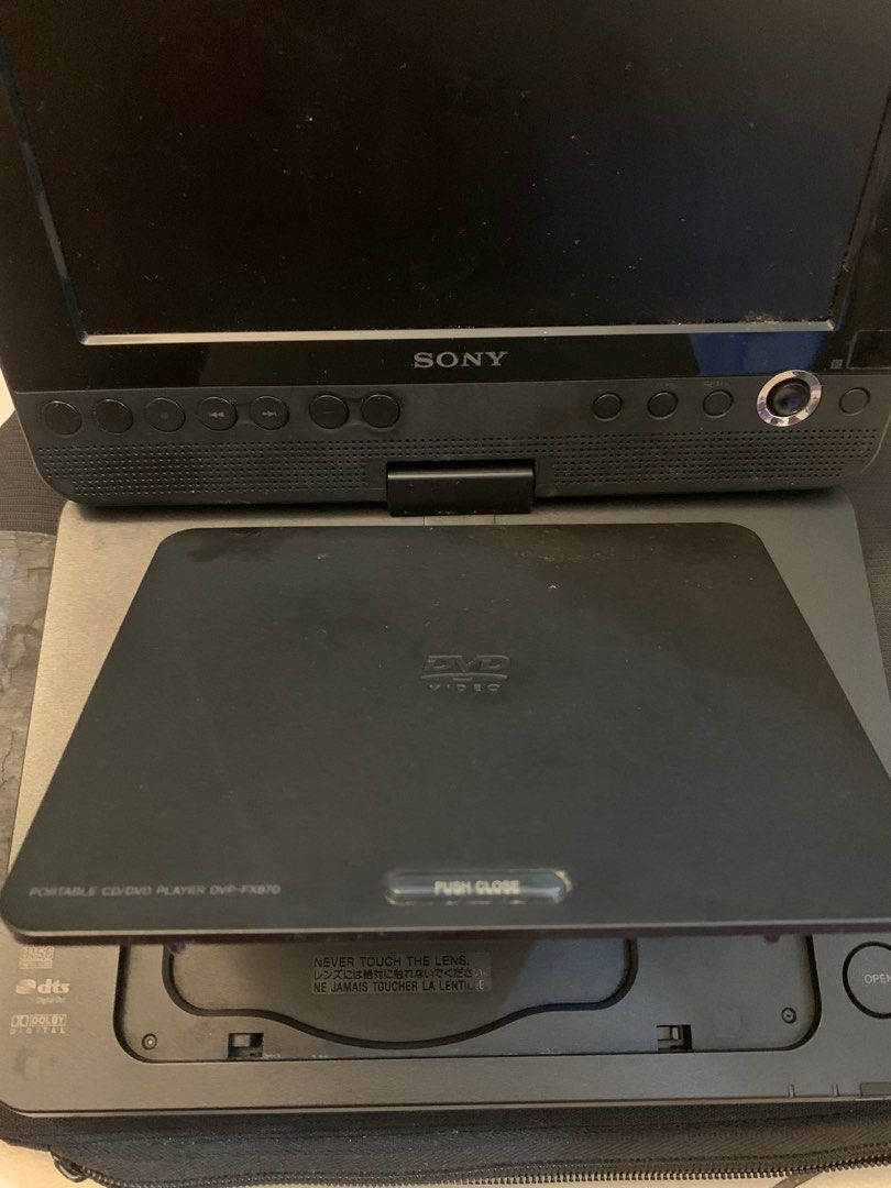 Sony Portable DVD Player (with Carry Case & Extra Battery) (Category: Printers, Scanners & Copiers) located in Taguig. Submitted by igeovaaan (Listing ID 1418512571, Image 3). Description: Sony Portable DVD Player (with Carry Case & Extra Battery) Selling an original Sony Portable DVD Player Working condition: Unsure since I have never tested it What’s included (as shown in photos): • Sony Portable DVD Player • Extra detachable battery • Sony car