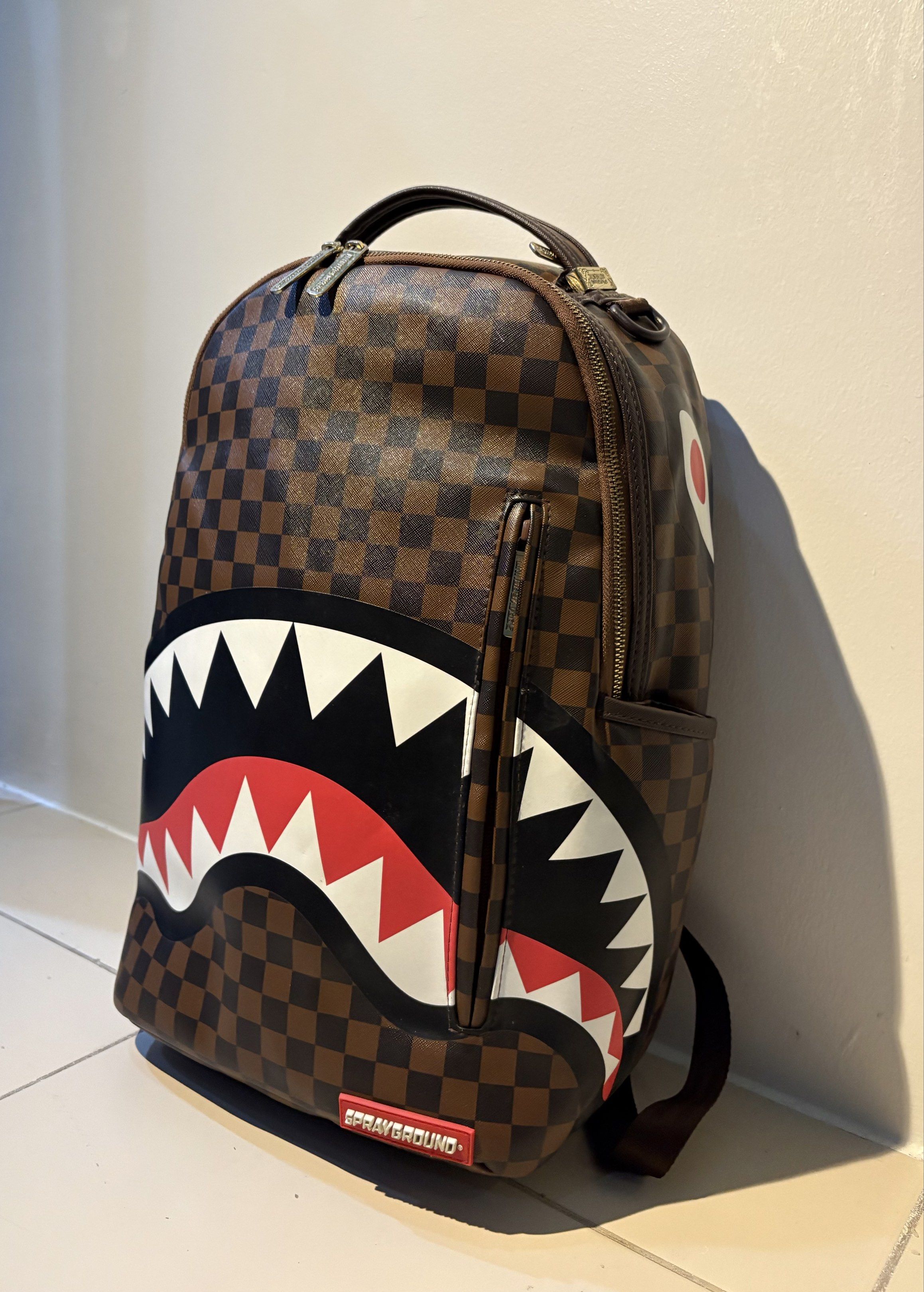 Sprayground Backpack (Category: Backpacks) located in Manila. Submitted by spiceverythingnice (Listing ID 1418427103, Image 1). Description: 100% Authentic Sprayground Sleek Sharks in Paris Brown Backpack 📍Manila.