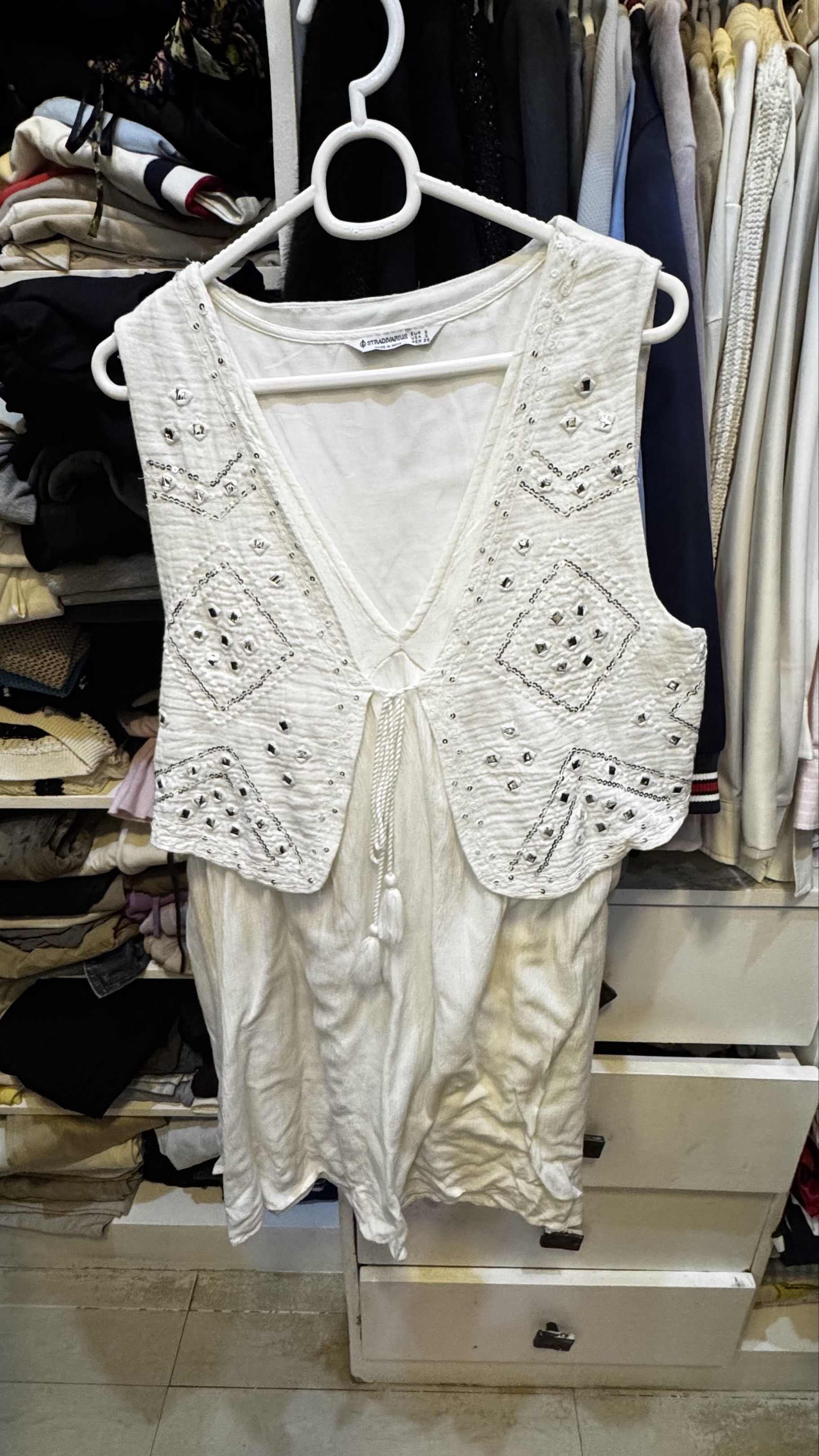 Stradivarius White Embellished Vest (Category: Others Tops) located in Mandaluyong City. Submitted by prelovedcole (Listing ID 1418462666, Image 1). Description: Worn only once Retails for 1,800.