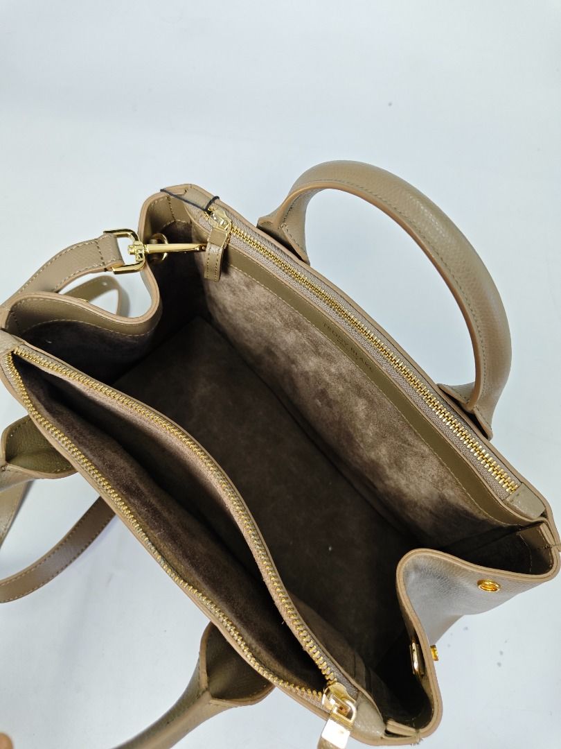 Teddy Blake Palmellato 12" "Etaupe" (Category: Cross-body Bags) located in Quezon City. Submitted by madtoken2 (Listing ID 1418558263, Image 3). Description: Teddy Blake Palmellato 12" “Etaupe” Price: P18,000 (Negotiable) Condition: Brand new - Never used with tag and box Description: The design of the Bella channels both classic&modern lines making it the perfect companion for today's woman. The sharp and structured shape is crafted in Italy fro
