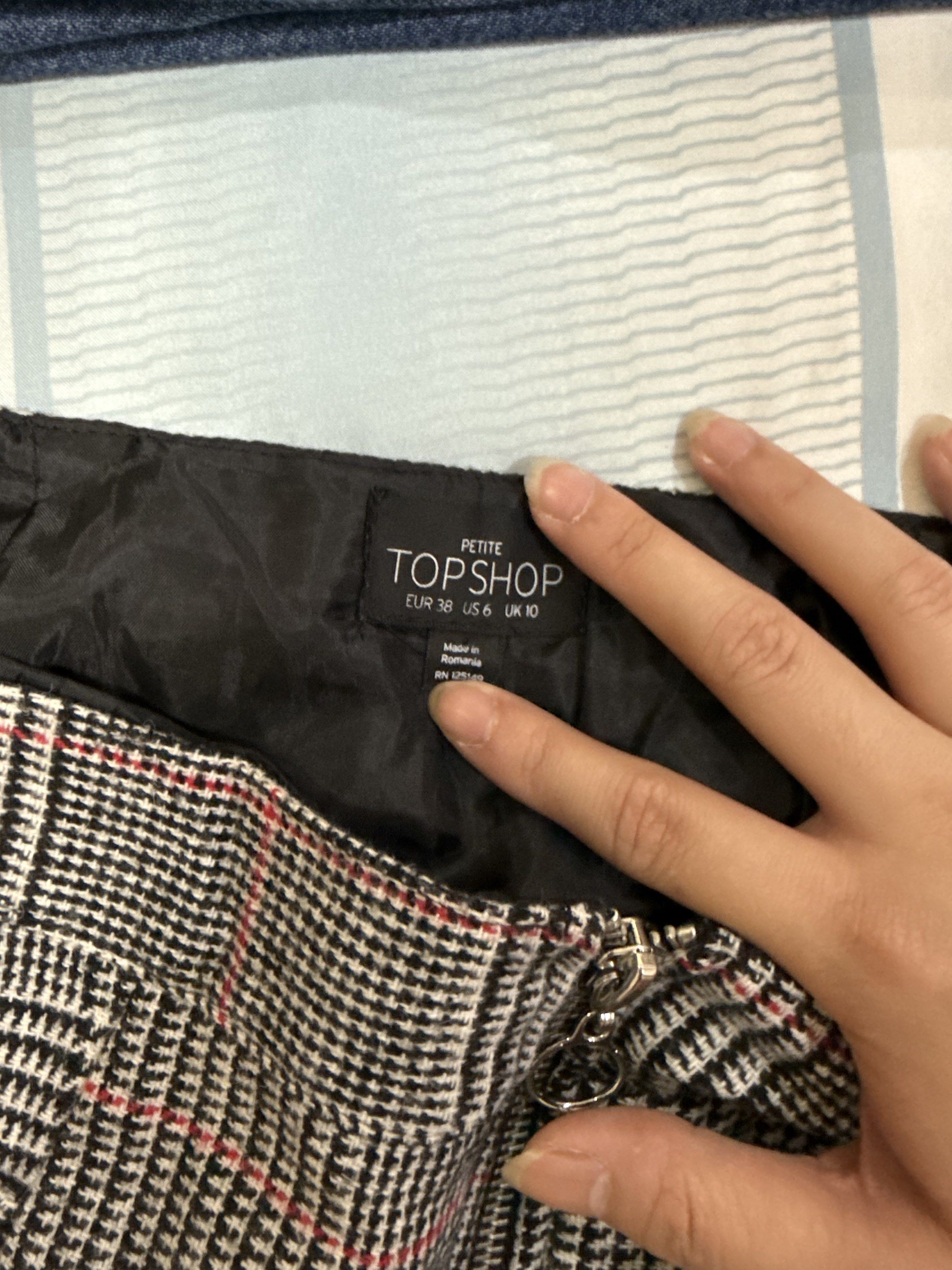 Topshop Plaid Mini Skirt (Category: Skirts) located in Las Pinas. Submitted by kva13 (Listing ID 1418426298, Image 2). Description: - Topshop Petite plaid skirt - Size: UK 10 / EUR 38 / US 6 - Features: Zipper closure, buckle details .