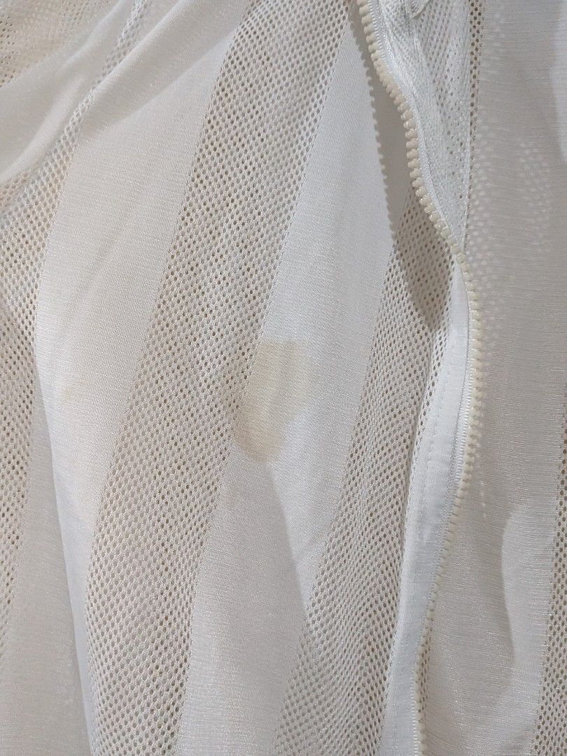 White Mesh Jacket with Hood (Category: Coats, Jackets and Outerwear) located in Quezon City. Submitted by stuff.decluttered (Listing ID 1418544130, Image 2). Description: - White mesh jacket - Hooded - Full-length zipper - Long sleeves - Ribbed hem and cuffs - Lightweight - Suitable for layering - Visible stain on front.