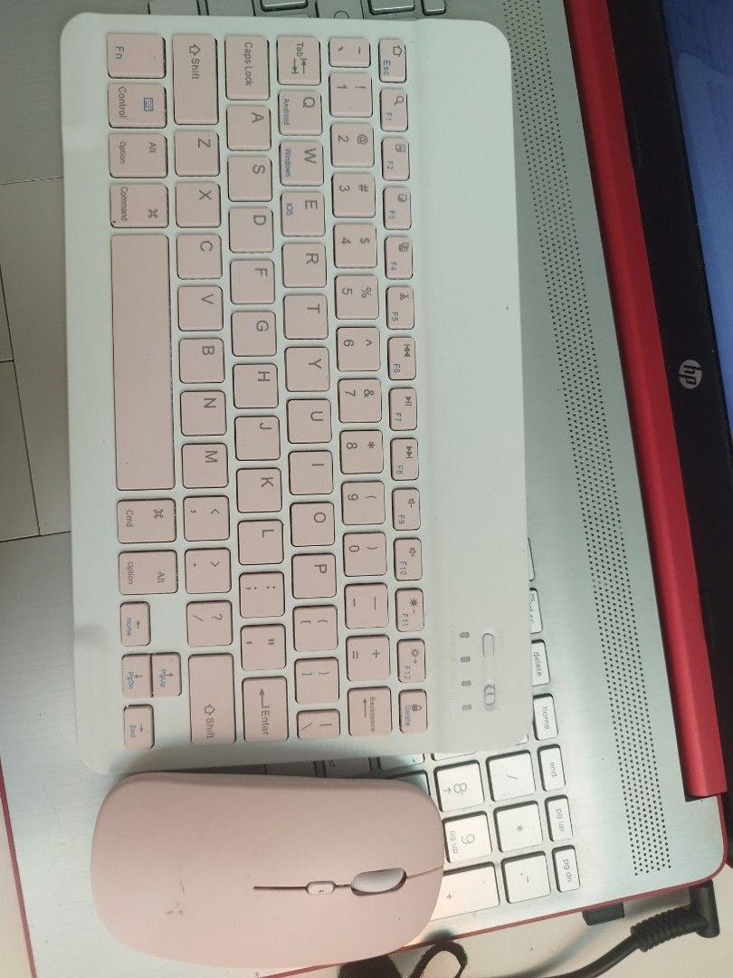 Wireless Keyboard and Mouse Set - Pink (Category: Computer Keyboard) located in Manila. Submitted by rrbr111 (Listing ID 1418466231, Image 2). Description: - Pink wireless keyboard and mouse set - Keyboard: Compact layout, pink keys, white body - Mouse: Ergonomic design, pink color - Stylish and functional set.