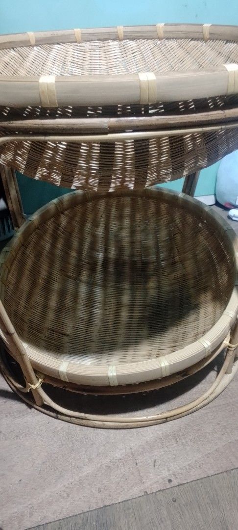 Woven Bamboo Side Table (Category: Tables & Sets) located in Manila. Submitted by swiftlion-6791 (Listing ID 1418493126, Image 2). Description: - Woven bamboo side table - Two-tiered design - Round top and lower shelf - Natural bamboo color - Ideal for plants, books, and decor - Sturdy frame - Classic design.