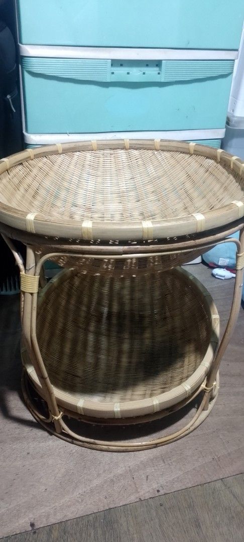 Woven Bamboo Side Table (Category: Tables & Sets) located in Manila. Submitted by swiftlion-6791 (Listing ID 1418493126, Image 3). Description: - Woven bamboo side table - Two-tiered design - Round top and lower shelf - Natural bamboo color - Ideal for plants, books, and decor - Sturdy frame - Classic design.