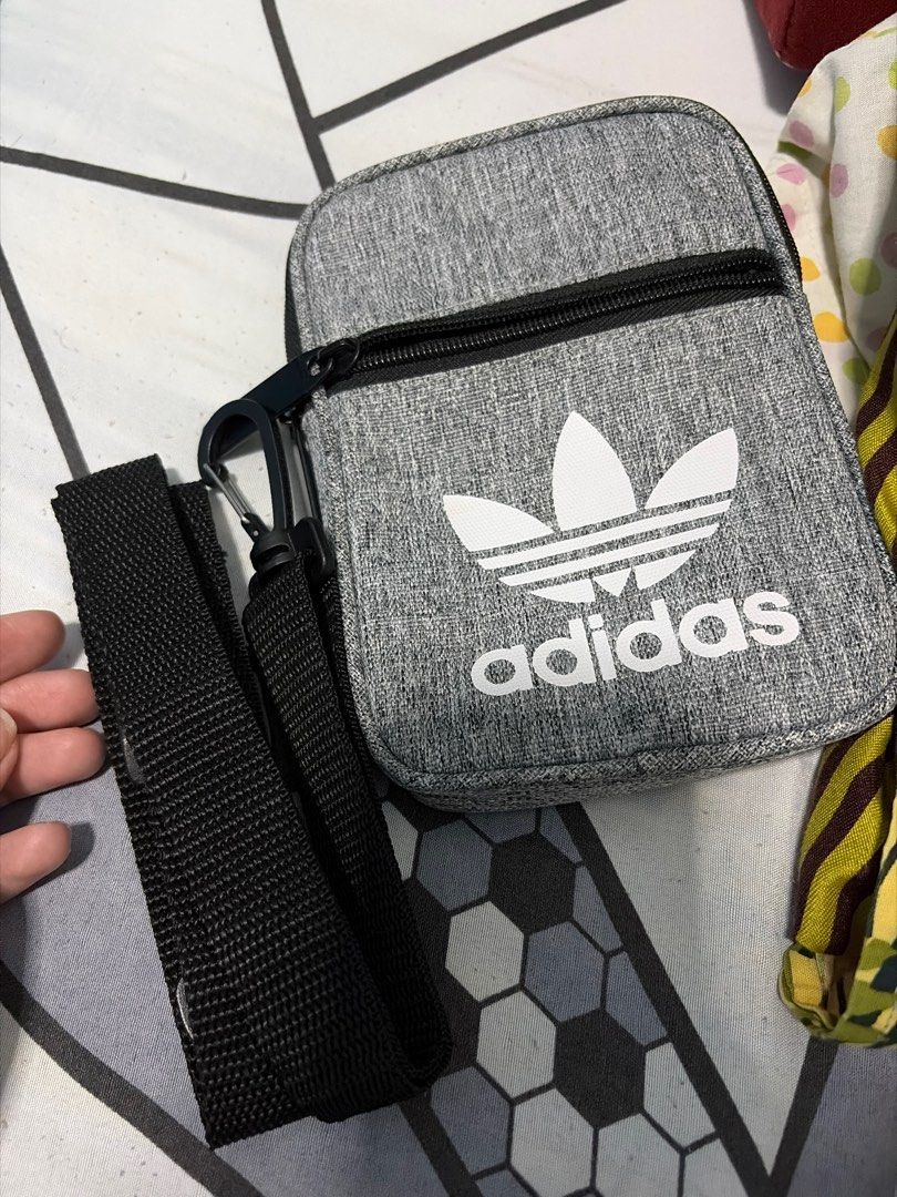 Adidas Sling Bag (Category: Sling Bags) located in Quezon City. Submitted by beeeeeeeeb (Listing ID 1413388842, Image 2). Description: Compact and stylish sling bag.