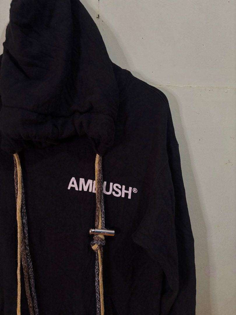 Ambush Black Hoodie multi cord (Category: Hoodies) located in Tayabas. Submitted by mandothriftss (Listing ID 1413243475, Image 2). Description: - Black Ambush hoodie - White logo on chest - Size 2 - Drawstring hood with rope detailing and metal clasp - Kangaroo pocket - Made in Japan.