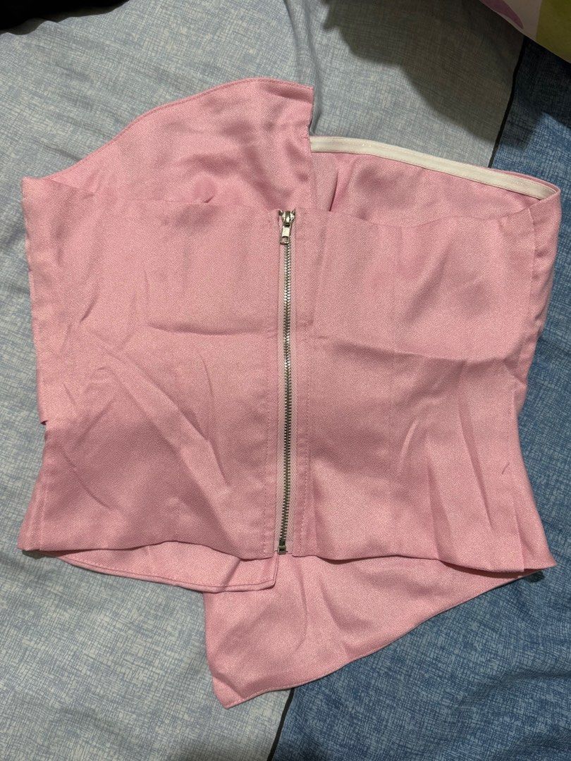 Asymmetrical Pink Tube Top (Category: Sleeveless) located in Manila. Submitted by itswayne (Listing ID 1413278311, Image 3). Description: - Asymmetrical tube top - Soft pink color - Smooth, satin-like material - Front zipper detail - Strapless design - Versatile for casual or dressy outfits - used once only - rfs: i have a similar pink top hehe.