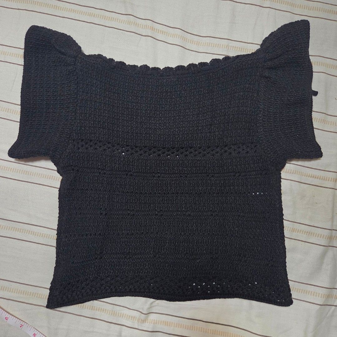 BKK Chest Black Crochet Top (Category: Sleeveless) located in Malabon City. Submitted by maracon (Listing ID 1406300955, Image 3). Description: 💯 Brand New, sinukat lang RFS: Hindi bagay sa mataba kong braso 🥲 📏 Sizes - Length: 16 inches - Bust: ○ 30 inches (Relaxed) ○ 36 inches (Max ○ 34 (Recommended fit) - Shoulder width: 13 inches (Left to Right) - Black crochet top - Square neck - Textured, open-weave material.