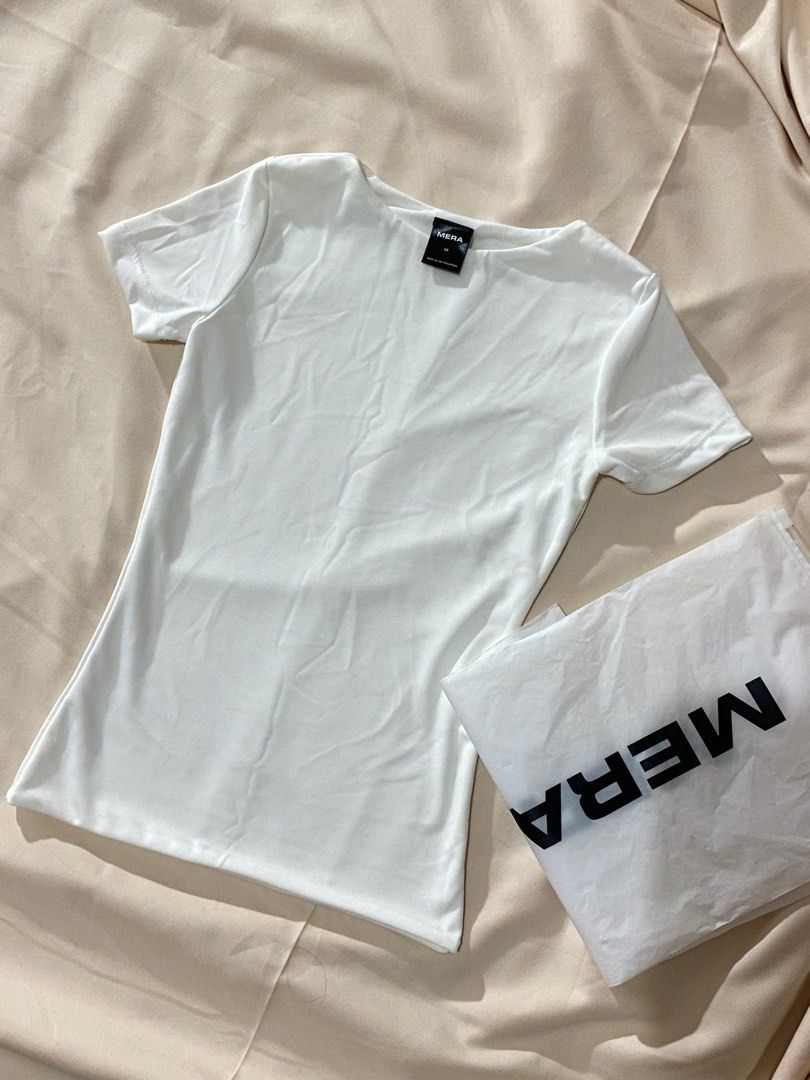 MERA Premium Naomi in White (Category: Shirts) located in Paranaque City. Submitted by k9kl.o (Listing ID 1413369481, Image 2). Description: Brand New MERA Premium Naomi Top in White XS with MERA Plastic Bag.