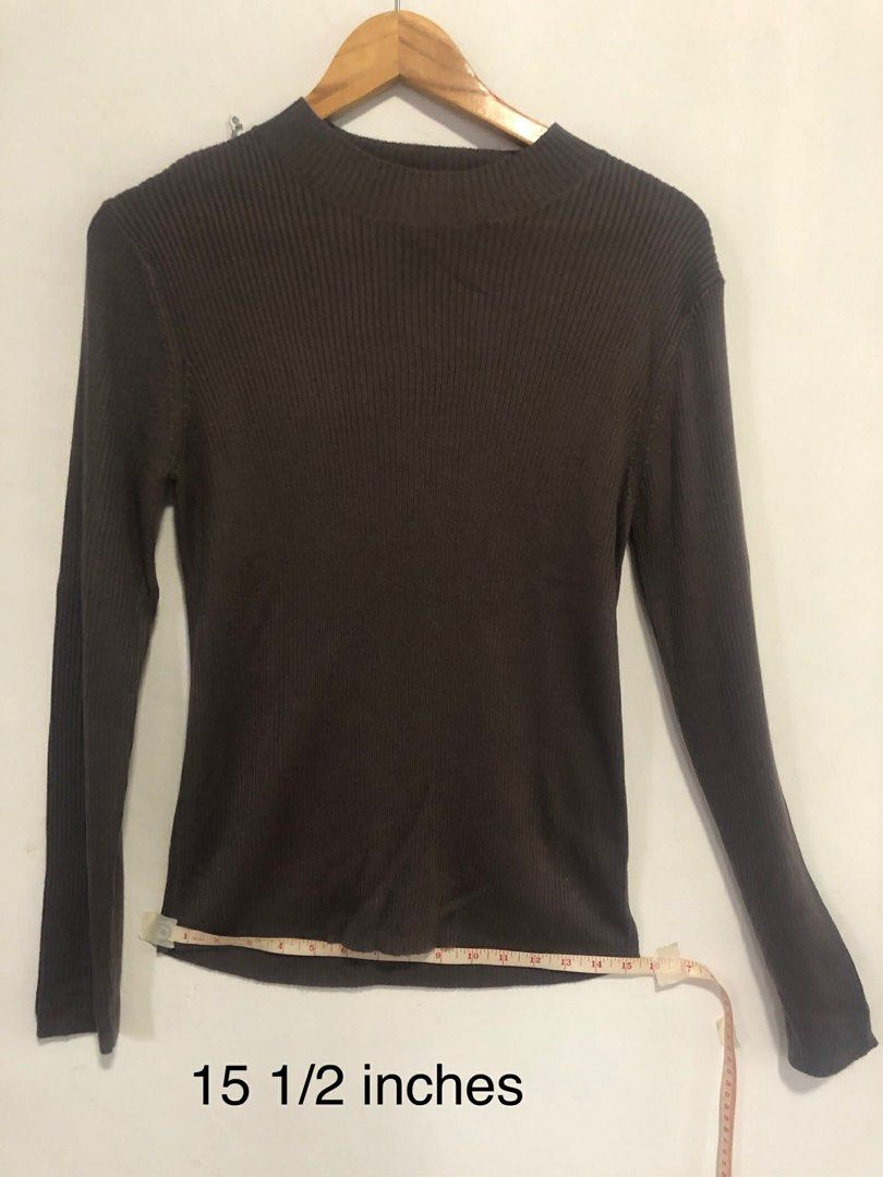 Brown Ribbed Long Sleeve Sweater (Category: Longsleeves) located in San Pedro. Submitted by offspaces__ (Listing ID 1413320366, Image 1). Description: - Brown ribbed long sleeve sweater - Mock neck - Fitted silhouette - Measurements: - Waist: 15.5 inches - Sleeve Length: 25.5 inches - Length: 26 inches - Versatile for layering or wearing alone.