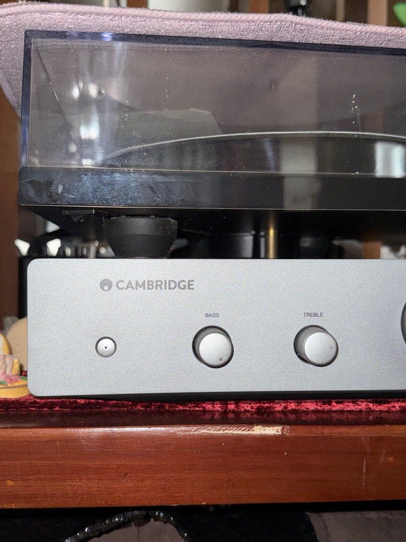 Cambridge AXA25 Integrated Amplifier (Category: Soundbars, Speakers & Amplifiers) located in Quezon City. Submitted by darkbleu (Listing ID 1413386882, Image 1). Description: - Cambridge AXA25 integrated amplifier - Bass and treble controls - Volume knob - Power button - Silver color - Cambridge logo on front panel - Model number visible.