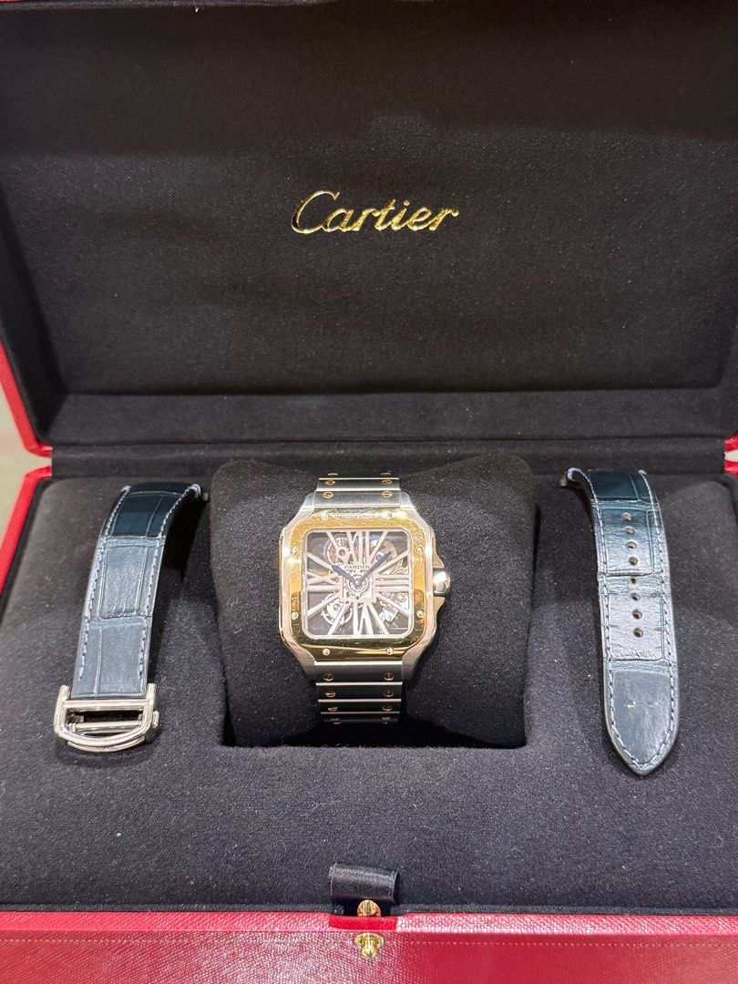 Cartier Santos Skeleton Watch (Category: Luxury Watches) located in Makati City. Submitted by itsyourwatches (Listing ID 1413258296, Image 1). Description: Cartier Santos Skeleton steel/18k yellow gold Manual Wind 39mm x 47mm ref-whsa0019 W/box, warranty card & 1 blue leather strap year 2022 .
