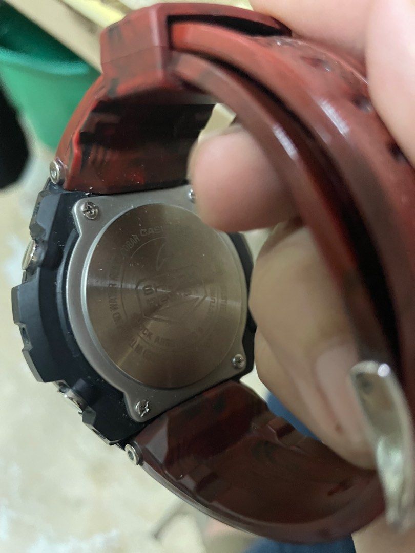 Casio G-Shock GST-210M Watch (Category: Men's Watches) located in Balanga. Submitted by jza_mery (Listing ID 1413288718, Image 2). Description: - G-Shock watch with a striking black and red design. - Features a digital display showing time, date, and alarm. - Built for durability: water-resistant and shock-resistant. - Stylish red strap with a textured finish. - Durable stainless steel bezel and a sleek black case. No issue Watch only also availa