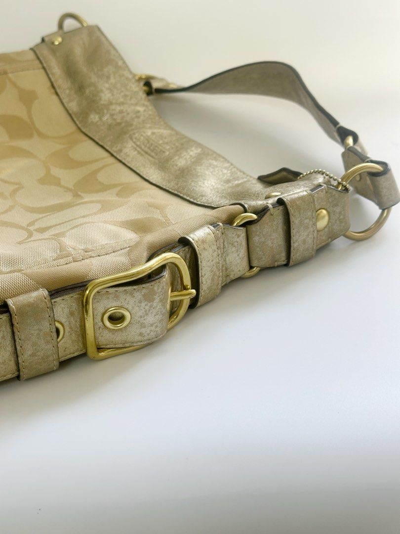 Coach Zoe Signature Bag (Category: Luxury Bags & Wallets) located in Taguig. Submitted by shoppiaholic (Listing ID 1413331219, Image 3). Description: 100% authentic - Visible discoloration and patina on the leather - Canvas and structure remain intact No major flaws No inclusions .