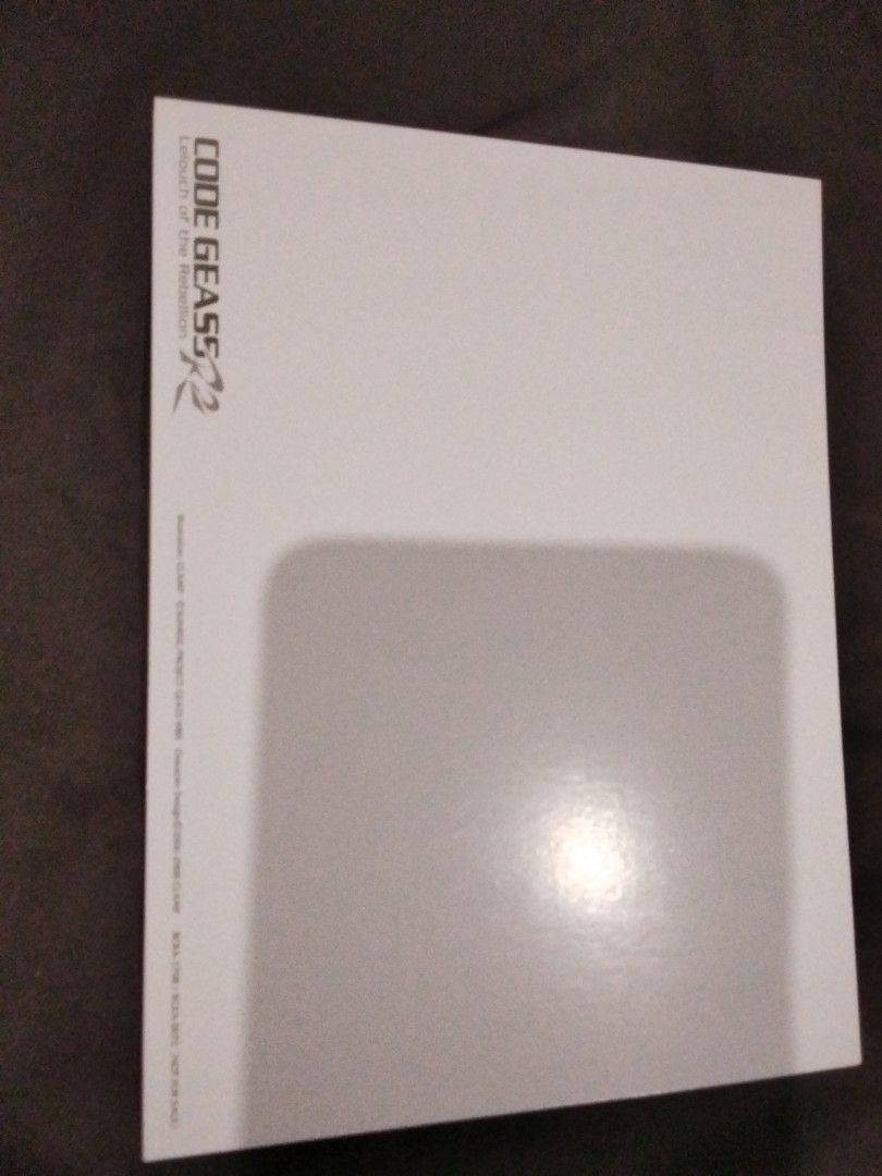 Code Geass Art Cards (Category: Raw Singles) located in Santa Rosa. Submitted by animemerchcollection (Listing ID 1413331770, Image 2). Description: - Code Geass art card set. - Features characters and scenes from the anime. - Cards are in original packaging. - Box includes Code Geass logo and details. - 7 cards are visible..