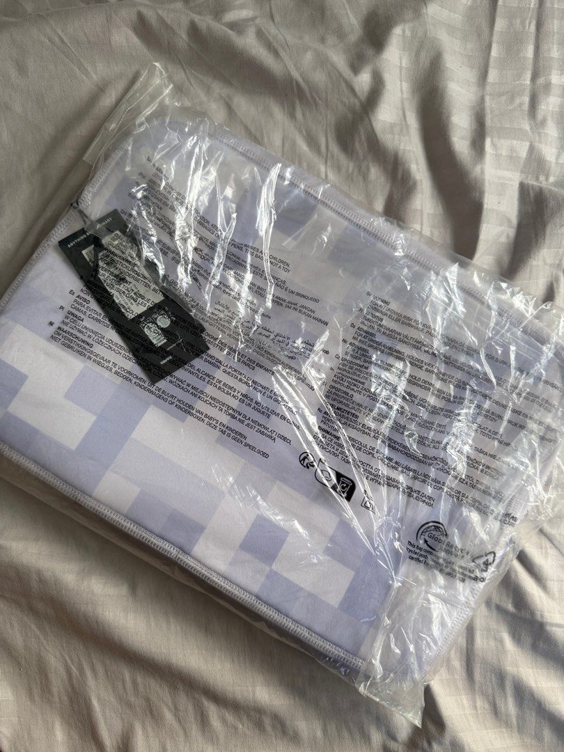 Cotton On Laptop Sleeve 13inch (Category: Laptop Bags & Sleeves) located in Trece Martires City. Submitted by kymconcepcion (Listing ID 1413234401, Image 3). Description: - Brand new Cotton On laptop sleeve - Made with 90% recycled materials - Stylish white and light blue checkered pattern - Secure zipper closure - Protects your laptop from scratches and damage - Comes in original packaging - Can ship via GGX (SF is not yet included).