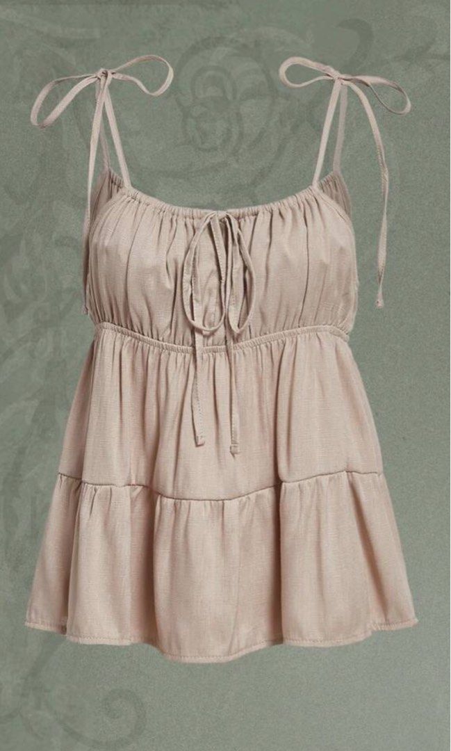 Cream Vintage Top (Category: Sleeveless) located in Quezon City. Submitted by alex_declutter (Listing ID 1413422482, Image 1). Description: -fits xs-s -adjustable straps.