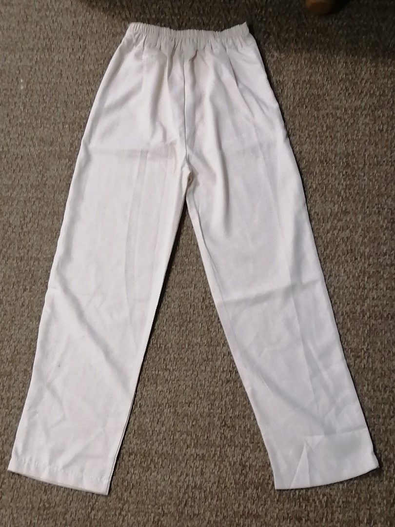Cream Wide Leg Trousers (Category: Other Bottoms) located in Paranaque City. Submitted by noir.gap (Listing ID 1413390351, Image 2). Description: - Cream wide-leg trousers - High-waisted design - 2 button closure - Front pleats - Elastic waistband at the back - Lightweight fabric - Nice cream color Never worn. Bought online but did not fit..