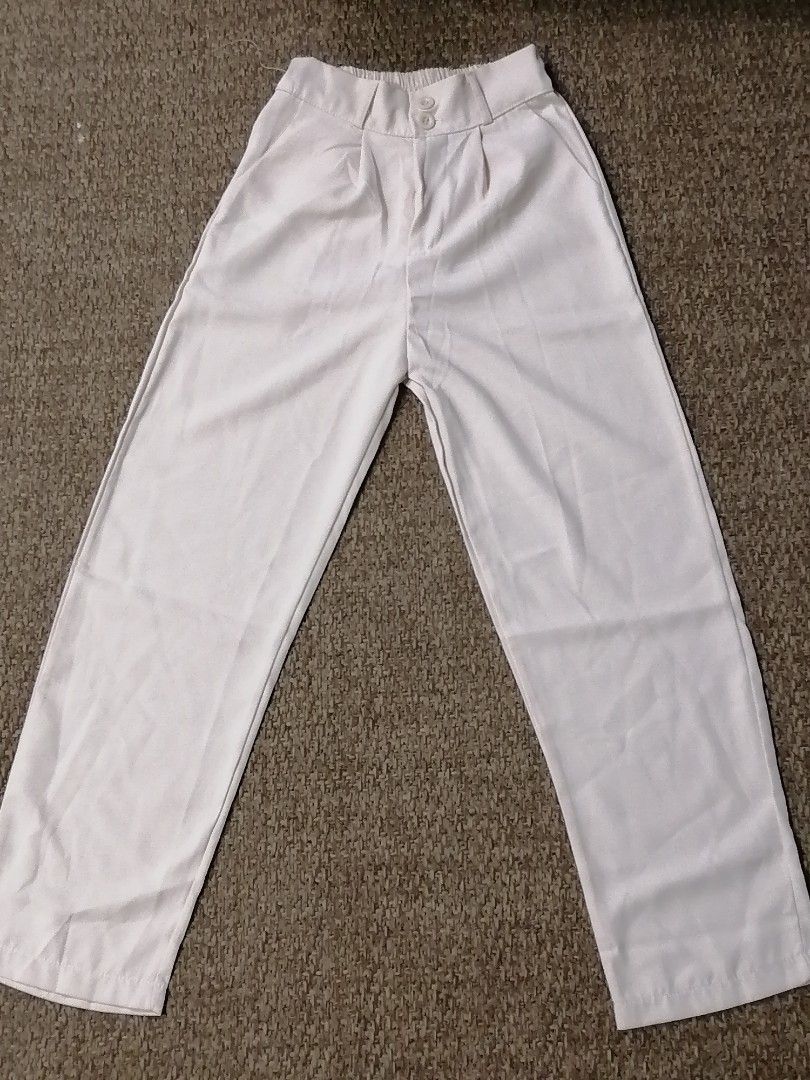 Cream Wide Leg Trousers (Category: Other Bottoms) located in Paranaque City. Submitted by noir.gap (Listing ID 1413390351, Image 1). Description: - Cream wide-leg trousers - High-waisted design - 2 button closure - Front pleats - Elastic waistband at the back - Lightweight fabric - Nice cream color Never worn. Bought online but did not fit..
