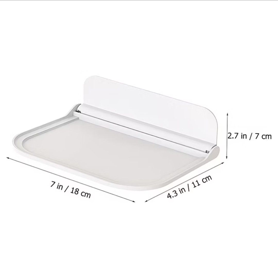 Foldable Floating Shelf / Wall Mounted Plastic Rack (Category: Shelves, Cabinets & Racks) located in Davao. Submitted by barely.rushed (Listing ID 1413377431, Image 1). Description: - Space-saving foldable wall shelf. - Stylish and simple design. - Strong bearing capacity. - Easy adhesive installation. - Dimensions: Approximately 18cm x 11cm x 7cm..