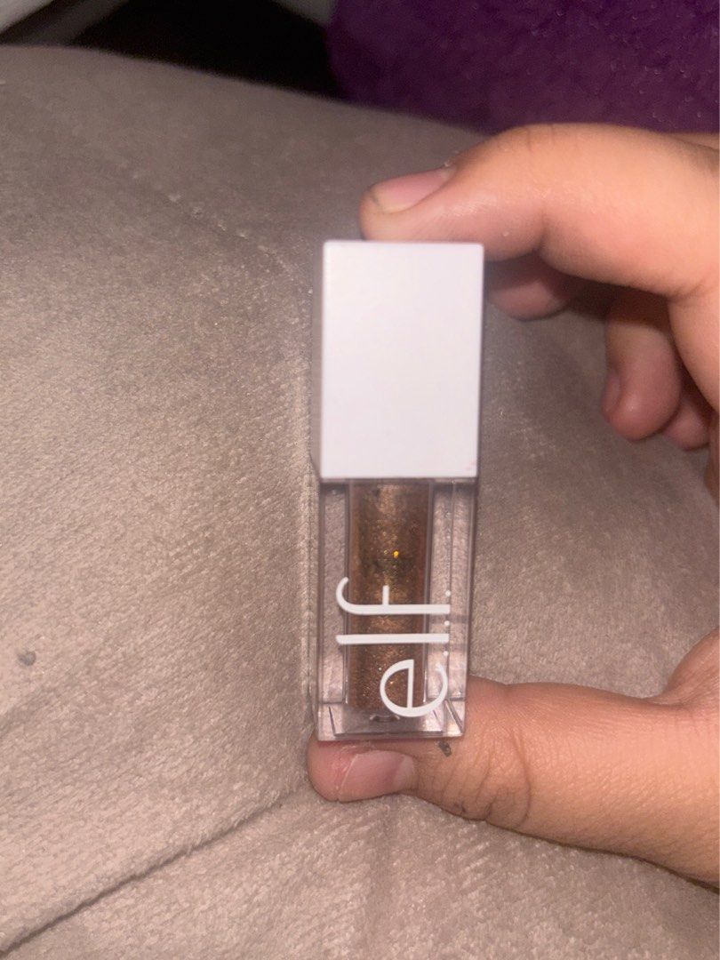 e.l.f. Liquid Glitter Eyeshadow - Gold (Category: Makeup) located in Las Pinas. Submitted by betchieluvr6000 (Listing ID 1413428421, Image 2). Description: E.l.f. Liquid Glitter Eyeshadow - Bronze. Easy to apply, long-lasting sparkle! RFS Decluttering. Gifted to me. Only used once to swatch. Originally Php 700.
